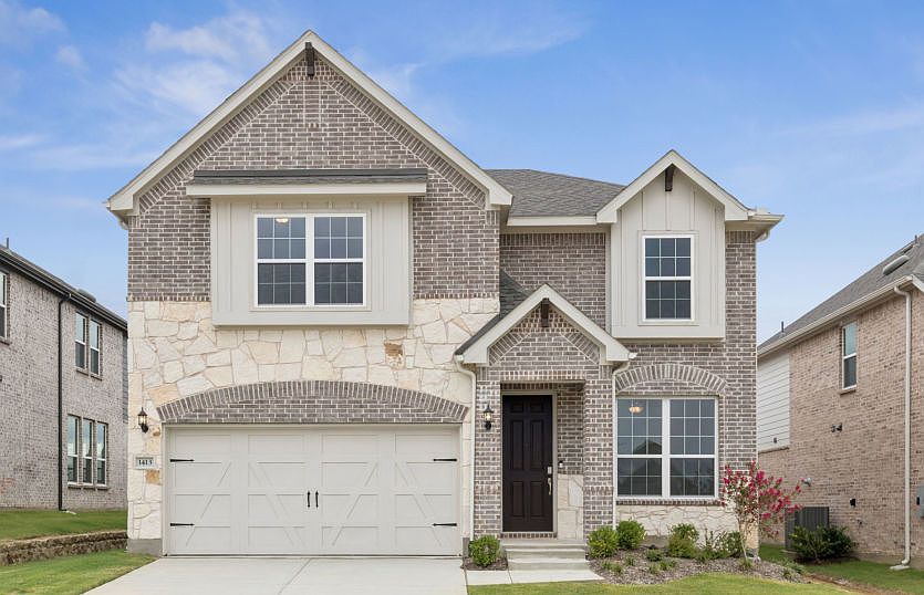 The Hamilton, a two-story home with 2-car garage