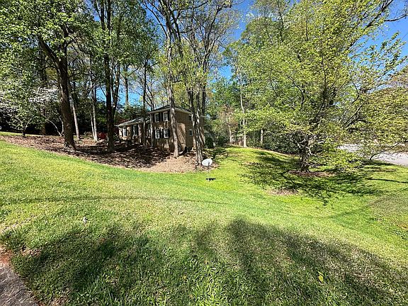 House is on the corner of a cul-de-sac