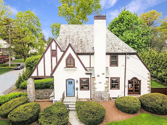 Your storybook sun-drenched Tudor home awaits!