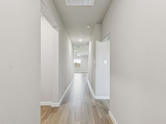 Entryway in the Harper home plan by Trophy Signature Homes - REPRESENTATIVE PHOTO