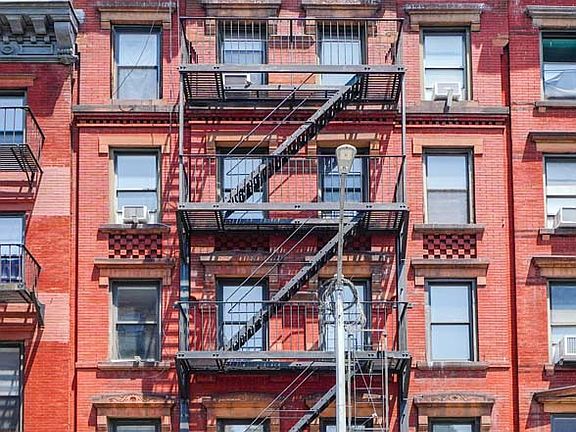 5th image of 329 E 9th St APT 4