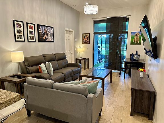 Living room with view of patio area