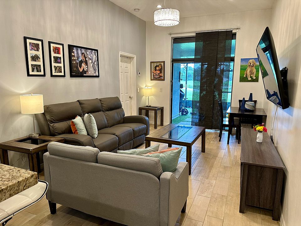 Living room with view of patio area