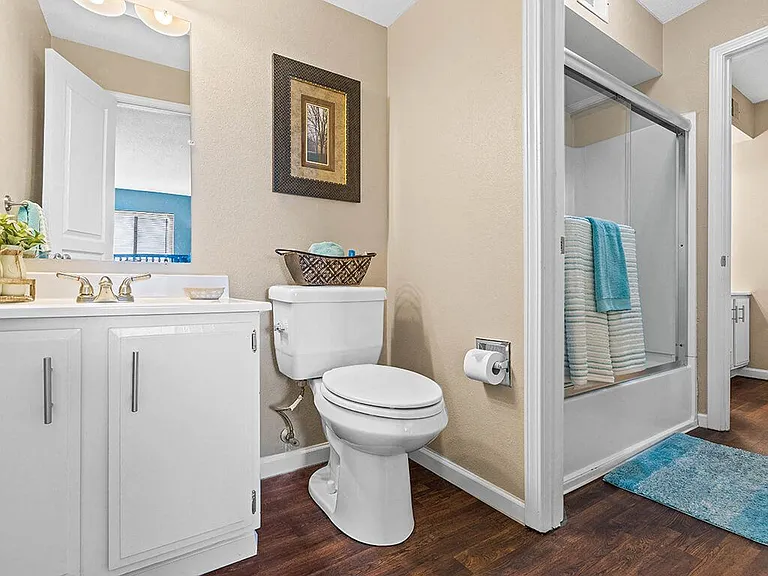 Well-Lit Vanity Space with Private Shower Space