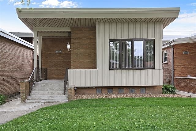 1st image of 9029 S Oglesby Ave