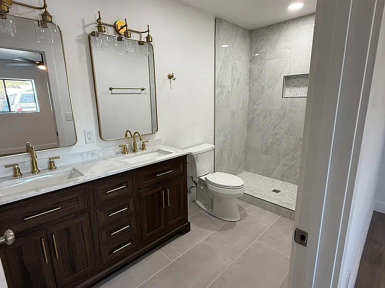 Ensuite 1 Bathroom with Double Vanities and Shower