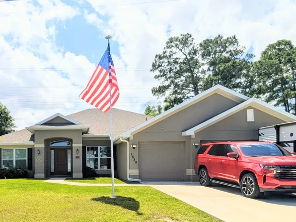 1858 SW Mackenzie Street, Port St Lucie, FL 34953