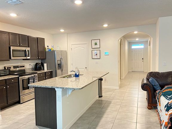 4th image of 5622 Breezy Palm Pl