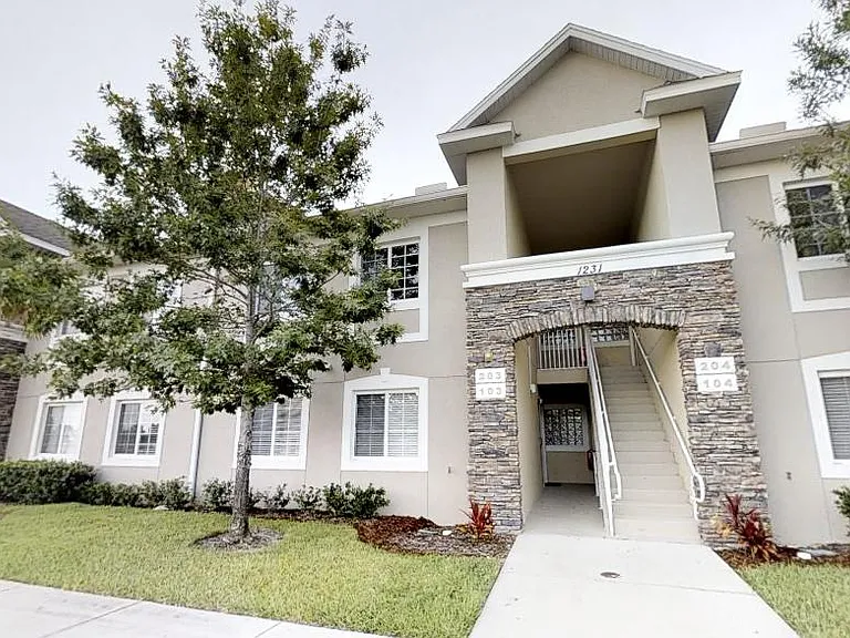 This condo unit is one flight of stairs up, on the second floor.