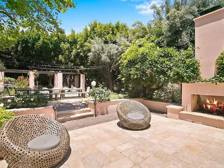Enriching outdoor space with a cracking fire pit.