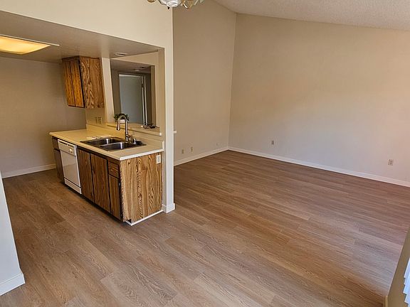 Brand new flooring and baseboards!
There is a dining room and a living room and lots of natural lighting.