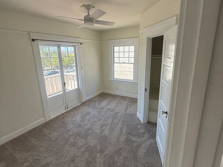 Second bedroom with balcony