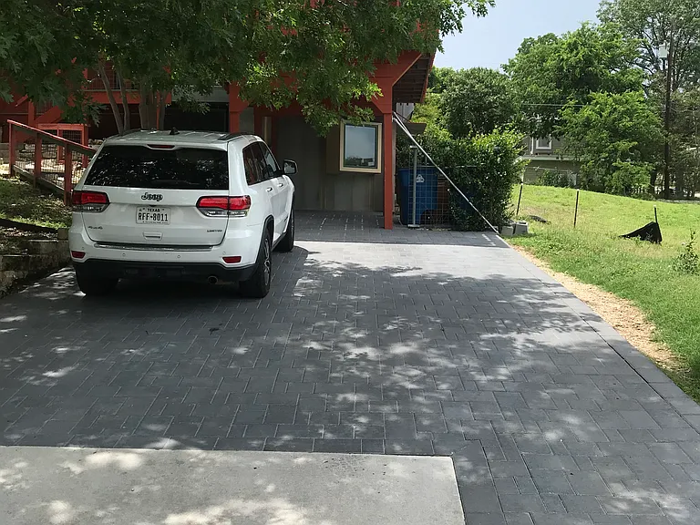 right side of driveway available for use by garage apartment tenant