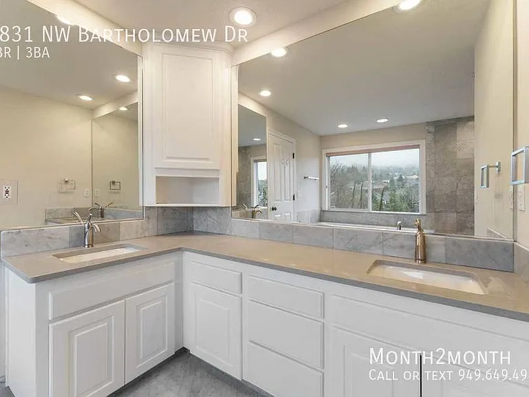 9831 NW Bartholomew Dr — Photo 21