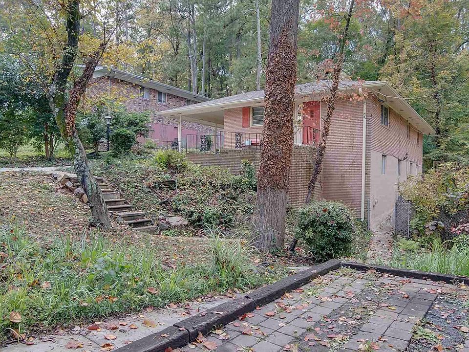 Front exterior and parking pad