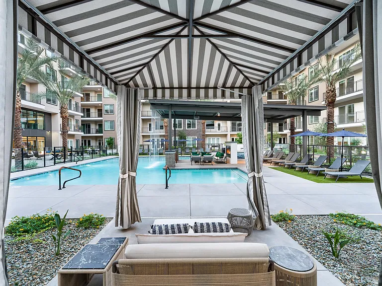 Enjoy shaded comfort and poolside views from the cabanas, perfectly positioned for a relaxing Arizona day.