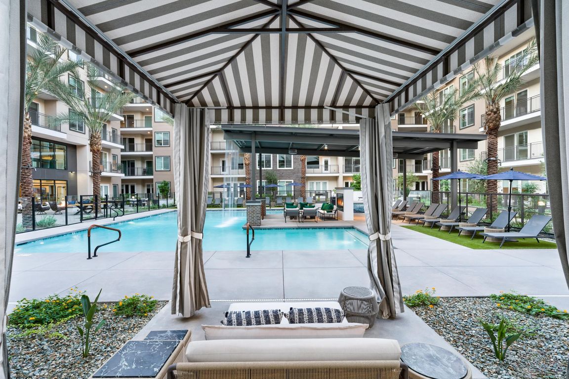 Enjoy shaded comfort and poolside views from the cabanas, perfectly positioned for a relaxing Arizona day.