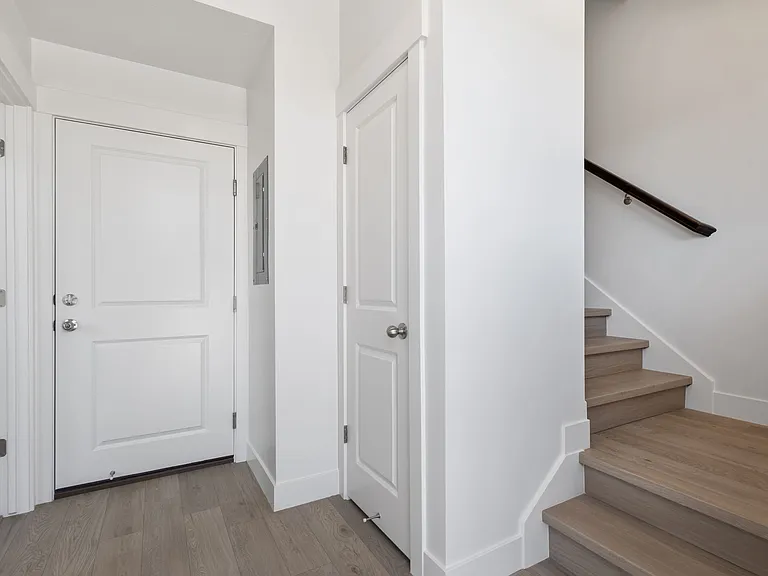 Entry way ft garage door, office door, stairs