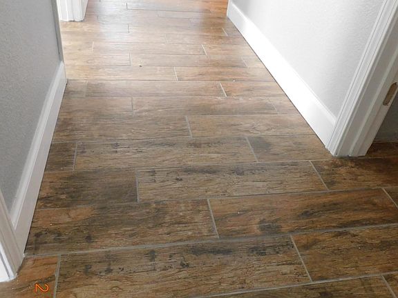 2 Private Bedrooms, secondary bathroom and interior laundry room off hallway