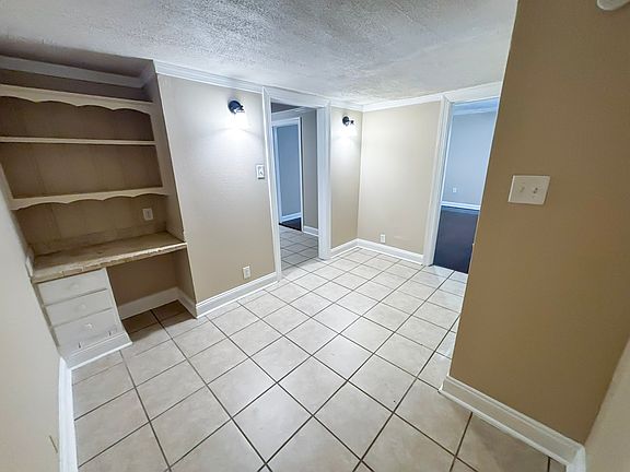 Perfect little entry area that could be easily made into an office or a breakfast nook. Comes complete with a coat closet!