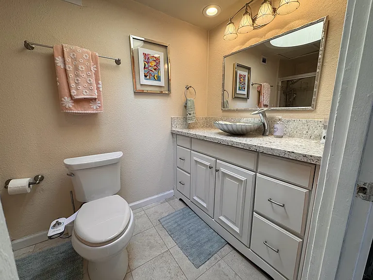 Master Bathroom, Tub with sliding doors, Bidet Toilet, Custom Seashell Sink!