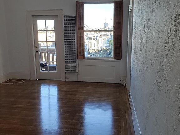 Living room with patio door.