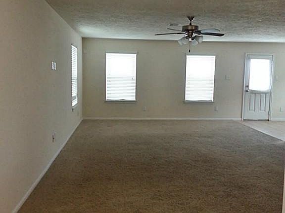 Very spacious living room w/tiled entry.