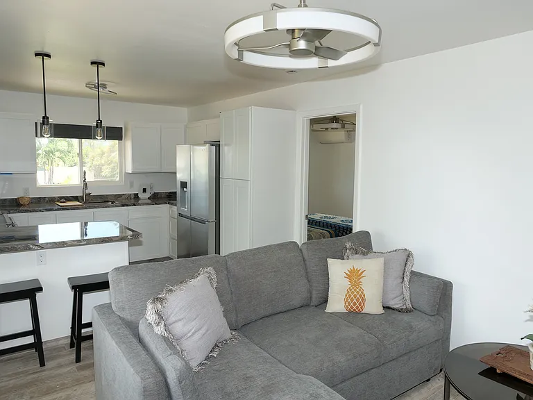 Well laid out kitchen and living room.