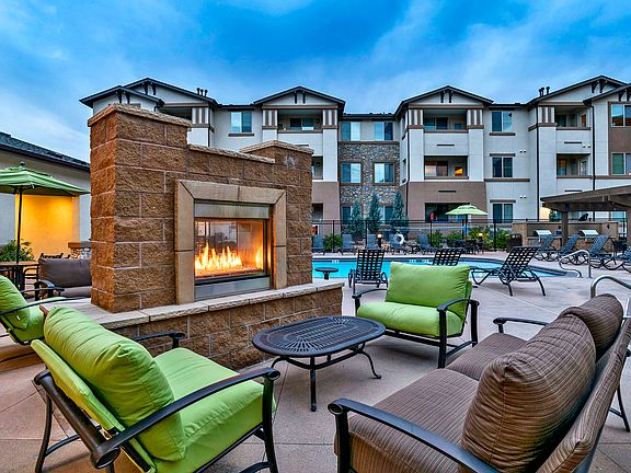 Outdoor fireplace and lounge area