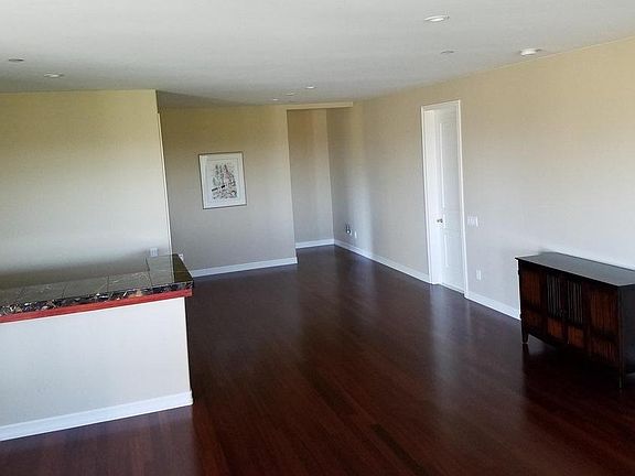 kitchenette on the left, laundry center room on the right.