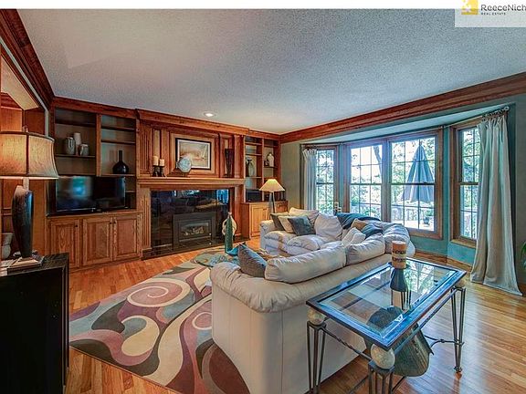 GREAT ROOM WITH BUILTINS AROUND THE FIREPLACE. ALL HARDWOODS ON FIRST FLOOR EXCEPT FOR TILED ENTRY