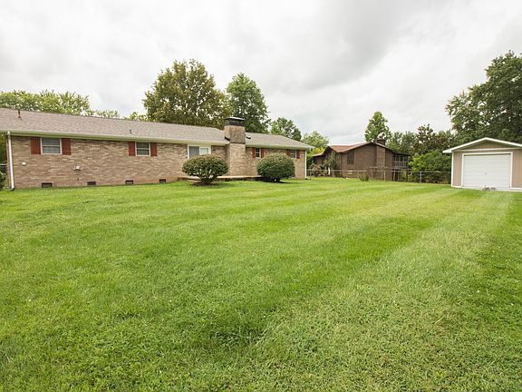 Large, flat, fenced in yard