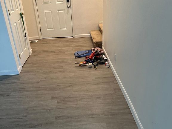 Front door, entry updated with luxury vinyl, 2024