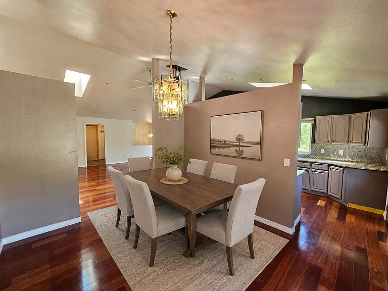 Virtually staged dining room.