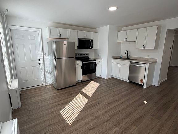 Modern kitchen with stainless steel appliances