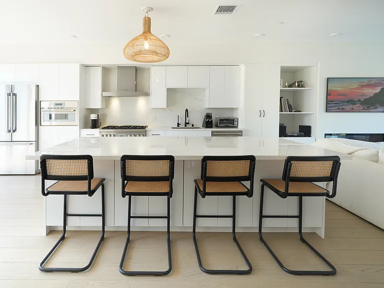 Island kitchen with push cabinets and extra storage in island on both sides