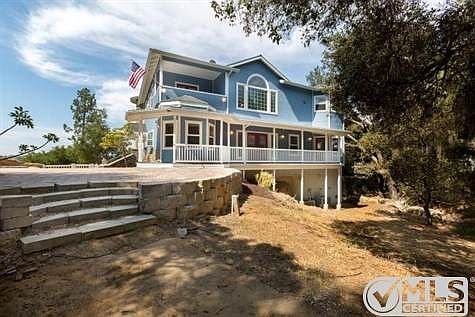 Expansive decks overlook the park-like backyard where you are sure to enjoy nature.