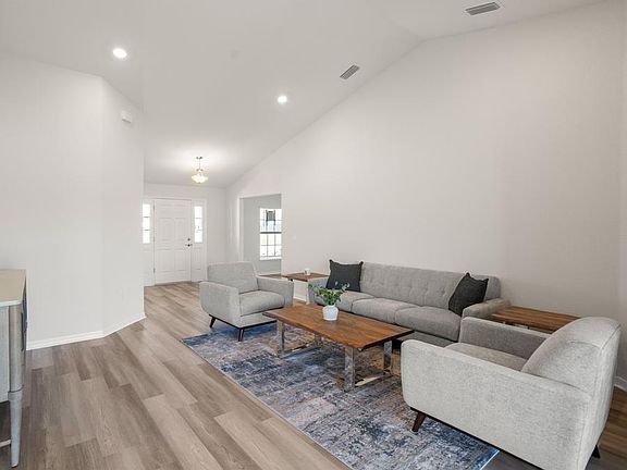 Airy volume ceilings are found in the living area, den, and secondary bedrooms - Ryleigh by Highland