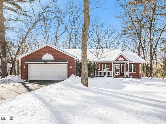 2nd image of 6627 W Riverwoods Ct NE