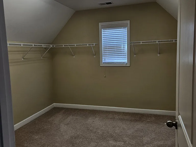 Master bed room walk in closet