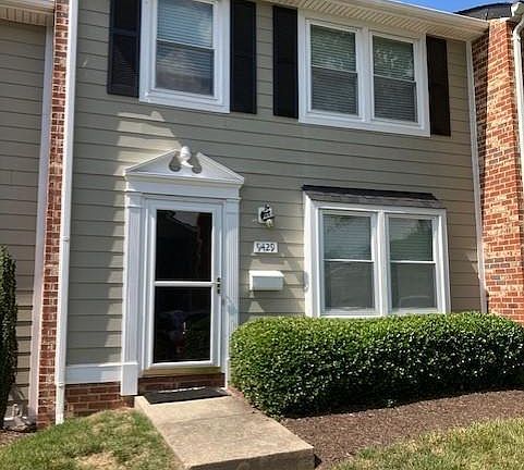 Charming curb appeal with professional landscaping!