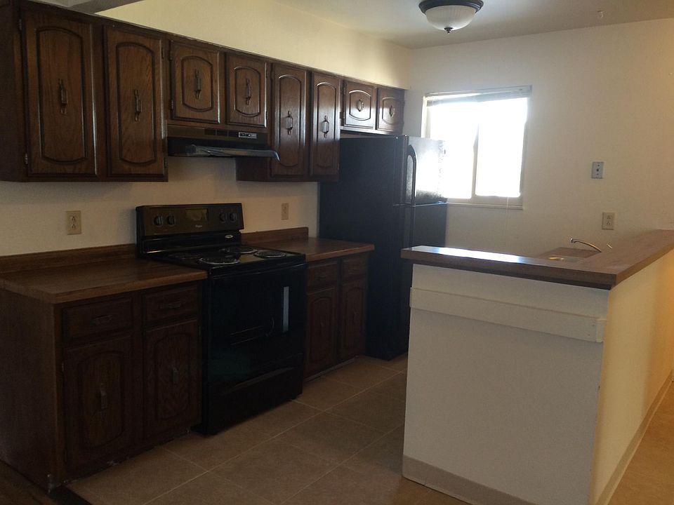 Nice sized kitchen with stove, refrigerator, and dishwasher