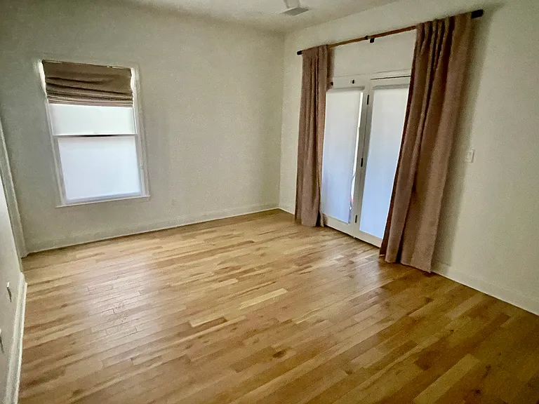 Bedroom (with private bath) + screened-in porch access