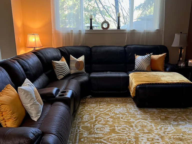 Living room. Picture provided by tenant. Note that rental is unfurnished.