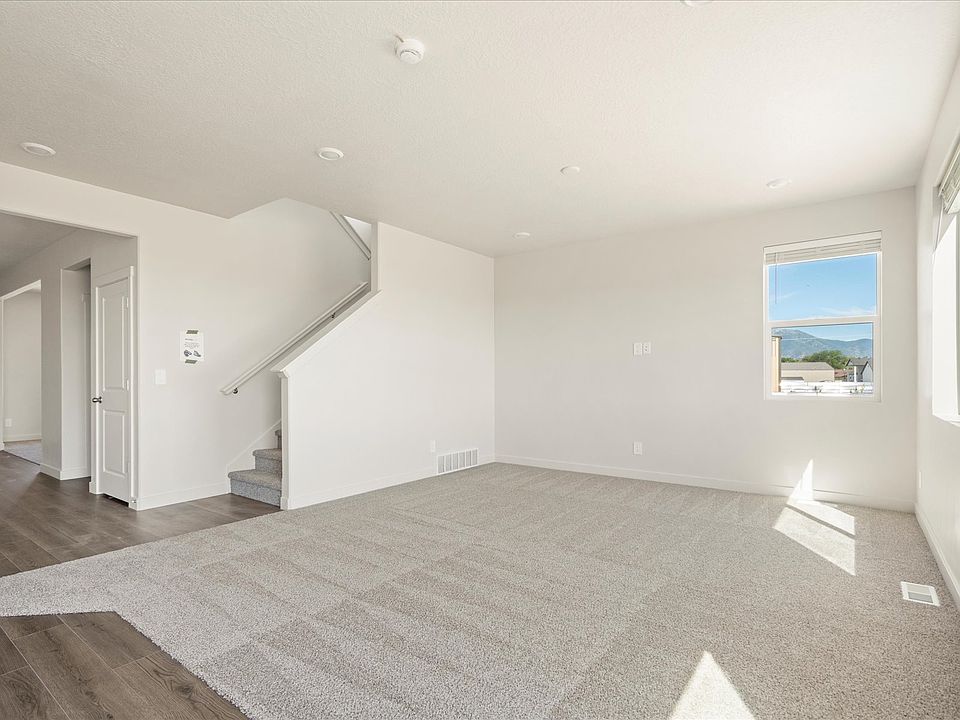 The Residence 5 floorplan interior image taken at a Meritage Homes Community in West Haven, UT.