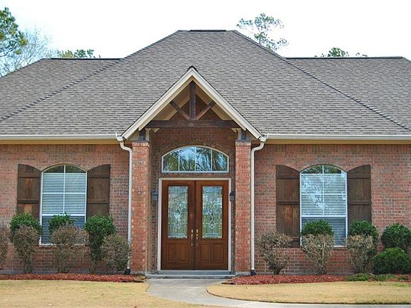 WEST FACING FRONT DOOR.