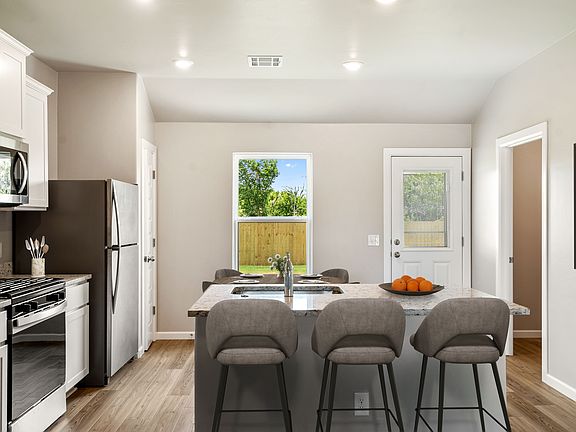 The kitchen connects to the breakfast nook.