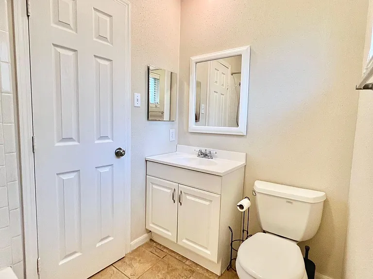 The secondary bathroom.