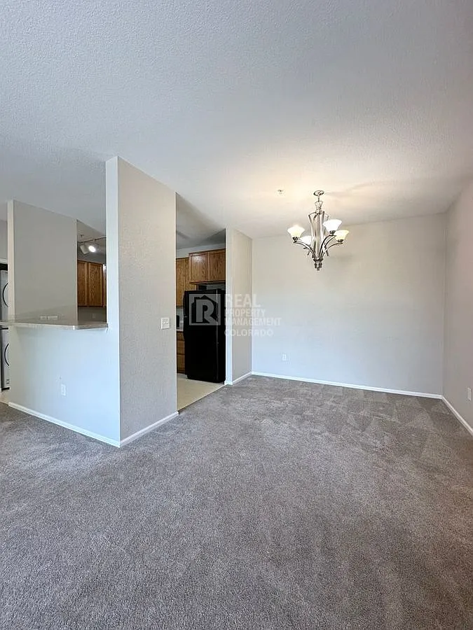 Spacious 2BR Condo with Pool Views, Garage & Resort-Style Community Amenities — Photo 4