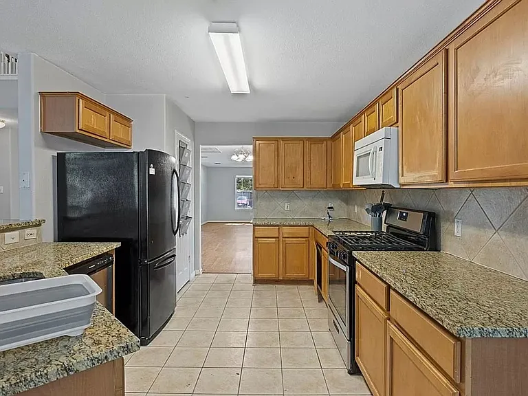 5720 Wharton Dr — Photo 4